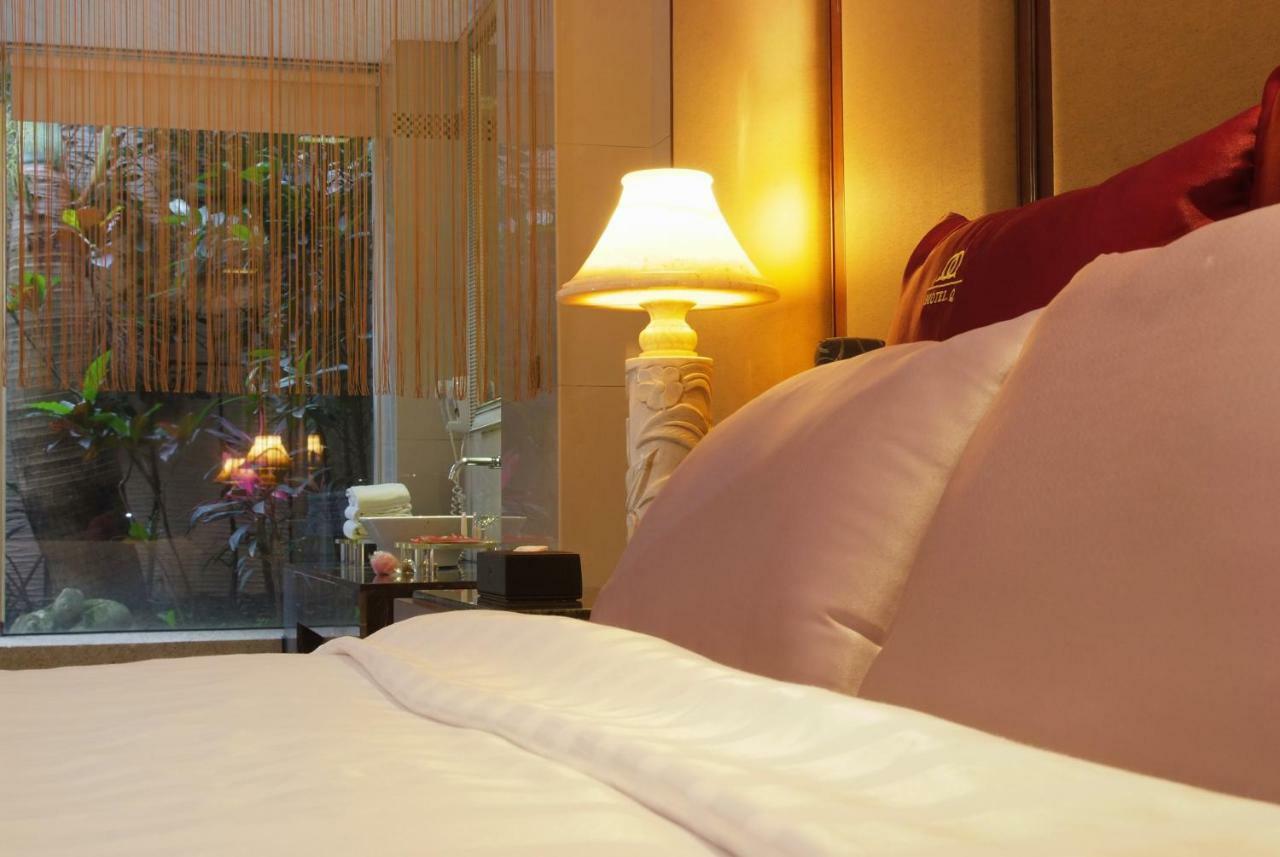 Q Motel精品旅館 Тученг Екстериор снимка